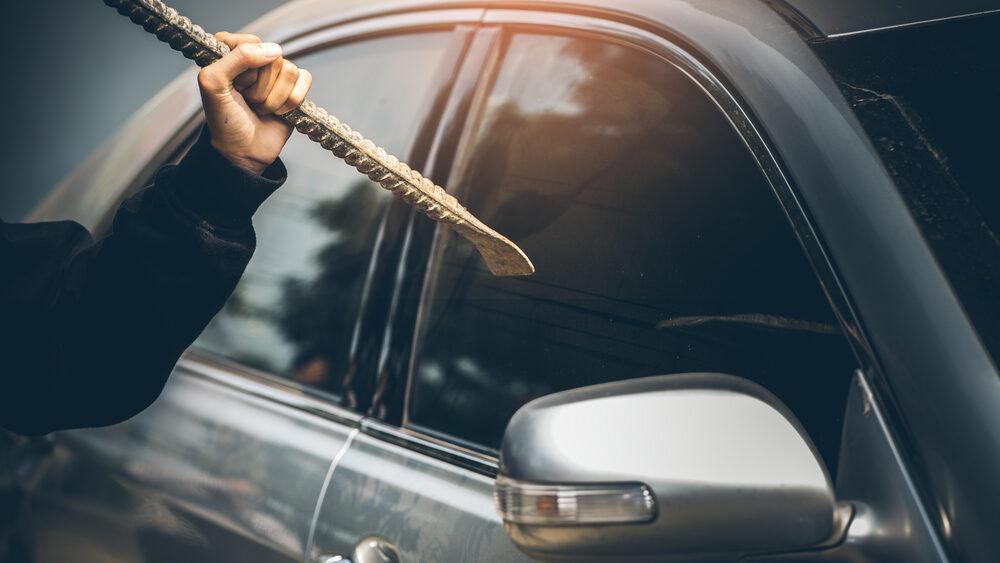 someone breaking into a car